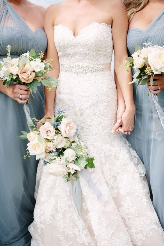 White bride and dusty blue bridesmaids for Blush and dusty blue wedding